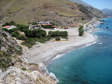 Ammoudi beach is slightly organized, with umbrellas and some taverns and rooms nearby